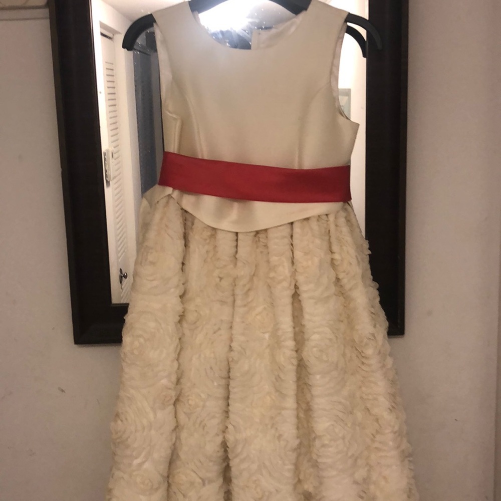 Worn once missing a bow a small stain